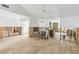 Bright living space with tile flooring ready for updates to create a cozy atmosphere at 4829 W San Miguel St, Tampa, FL 33629