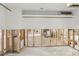 Large room featuring tile floors, a wall air conditioning unit and lots of space at 4829 W San Miguel St, Tampa, FL 33629