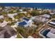 Aerial showcasing home with pool, solar panels, and bay views at 538 25Th Se Ave, St Petersburg, FL 33705