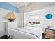 Nautical-themed bedroom with white dresser and bedding at 538 25Th Se Ave, St Petersburg, FL 33705