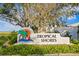 Tropical Shores community entrance sign with palm trees at 538 25Th Se Ave, St Petersburg, FL 33705