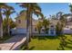 Attractive two-story house, featuring solar panels, and a spacious yard at 538 25Th Se Ave, St Petersburg, FL 33705