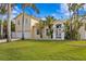 Two-story house with attached garage and manicured lawn at 538 25Th Se Ave, St Petersburg, FL 33705