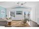 Relaxing living room with vaulted ceilings, comfy seating, and access to a balcony at 538 25Th Se Ave, St Petersburg, FL 33705