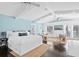 Spacious main bedroom with a king-size bed, sitting area, and access to a balcony at 538 25Th Se Ave, St Petersburg, FL 33705