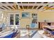 Relaxing patio with hanging chairs, outdoor seating, and TV at 538 25Th Se Ave, St Petersburg, FL 33705