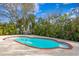 Inviting kidney-shaped pool with brick coping and surrounding patio at 538 25Th Se Ave, St Petersburg, FL 33705