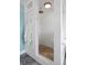 Walk-in shower with white subway tile and pebble flooring at 538 25Th Se Ave, St Petersburg, FL 33705