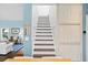 Stylish staircase with white risers and dark wood treads, leading to the upper level at 538 25Th Se Ave, St Petersburg, FL 33705