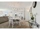 Elegant dining room featuring a round table with seating, complemented by stylish decor at 5575 Gulf Blvd # 425, St Pete Beach, FL 33706