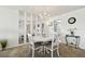 Elegant dining room featuring a round table with seating for four, and elegant decor at 5575 Gulf Blvd # 425, St Pete Beach, FL 33706