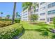 Beautifully landscaped grounds surround this well-maintained condo building with flowering shrubs and mature trees at 5575 Gulf Blvd # 425, St Pete Beach, FL 33706