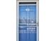 Blue front door with glass and unit number 425, reflecting the waterfront view at 5575 Gulf Blvd # 425, St Pete Beach, FL 33706