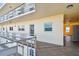 Hallway leading to the units overlooking the water and access to the outside at 5575 Gulf Blvd # 425, St Pete Beach, FL 33706