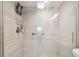 Shower features new tile, updated fixtures, and glass door at 5575 Gulf Blvd # 425, St Pete Beach, FL 33706