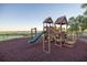 Community playground with swings and playset at 5610 Tidewater Preserve Blvd, Bradenton, FL 34208