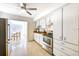 Modern kitchen with stainless steel appliances and white cabinets at 6105 Antrim St, New Port Richey, FL 34653