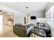 Open concept living room with a view into the kitchen area at 6105 Antrim St, New Port Richey, FL 34653