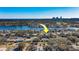 Wide aerial showcasing property location, waterfront, and city skyline at 783 Placido Ne Way, St Petersburg, FL 33704