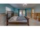 Bedroom with a dark brown bed frame, under renovation at 783 Placido Ne Way, St Petersburg, FL 33704