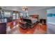 Spacious bedroom with hardwood floors and a large sleigh bed at 783 Placido Ne Way, St Petersburg, FL 33704