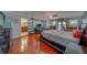Main bedroom with hardwood floors and ensuite bathroom at 783 Placido Ne Way, St Petersburg, FL 33704