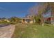House exterior showcasing landscaping and a paved driveway at 783 Placido Ne Way, St Petersburg, FL 33704