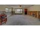 Under construction living room with exposed walls and flooring at 783 Placido Ne Way, St Petersburg, FL 33704