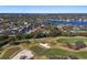 Aerial view showing home's location near golf course and water at 900 31St Ne Ave, St Petersburg, FL 33704