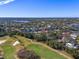 Aerial view of house near golf course and waterway at 900 31St Ne Ave, St Petersburg, FL 33704