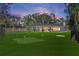 Backyard oasis with putting green and a large pool at 900 31St Ne Ave, St Petersburg, FL 33704