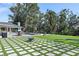 Large backyard with putting green and patio at 900 31St Ne Ave, St Petersburg, FL 33704