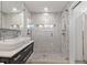 Spa-like bathroom with double sinks and large walk-in shower at 900 31St Ne Ave, St Petersburg, FL 33704