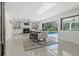 Open dining area with sliding glass doors leading to the patio and pool at 900 31St Ne Ave, St Petersburg, FL 33704