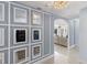Bright entryway with a stylish mirror feature wall at 900 31St Ne Ave, St Petersburg, FL 33704