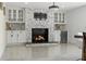 Elegant fireplace with built-in cabinetry and a modern design at 900 31St Ne Ave, St Petersburg, FL 33704