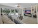 Spacious Gathering room with built-in media wall and pool access at 900 31St Ne Ave, St Petersburg, FL 33704