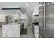 Stylish kitchen boasting stainless steel appliances and a spacious island with seating at 900 31St Ne Ave, St Petersburg, FL 33704