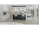 Modern kitchen with white and dark blue cabinets and island at 900 31St Ne Ave, St Petersburg, FL 33704