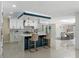 Stunning kitchen with marble countertops and a breakfast bar at 900 31St Ne Ave, St Petersburg, FL 33704