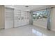Bright library featuring built-in shelving and large window at 900 31St Ne Ave, St Petersburg, FL 33704