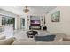 Relaxing living room with built-in shelving and access to the backyard at 900 31St Ne Ave, St Petersburg, FL 33704