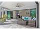 Outdoor patio with comfortable seating and view of interior at 900 31St Ne Ave, St Petersburg, FL 33704