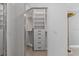 Bright walk-in closet with shelves and drawers at 900 31St Ne Ave, St Petersburg, FL 33704