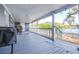 Spacious back porch overlooking a lake at 9465 50Th N Way, Pinellas Park, FL 33782
