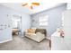 Second bedroom with couch and built-in vanity at 9465 50Th N Way, Pinellas Park, FL 33782