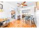 Bright dining area with wood floors and kitchen views at 9465 50Th N Way, Pinellas Park, FL 33782