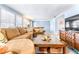 Spacious living room with sectional sofa and coffee table at 9465 50Th N Way, Pinellas Park, FL 33782