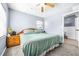 Large main bedroom with ensuite bathroom and ceiling fan at 9465 50Th N Way, Pinellas Park, FL 33782