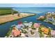 Aerial view of waterfront home with private dock and boat lift at 1024 Sonata Ln, Apollo Beach, FL 33572